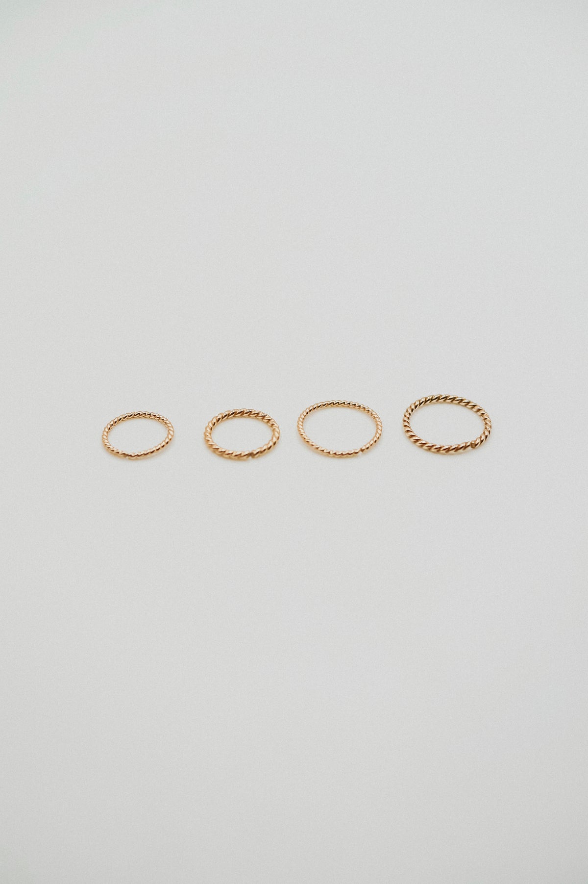 Twist Huggie Hoop Earring in Solid 14K Gold