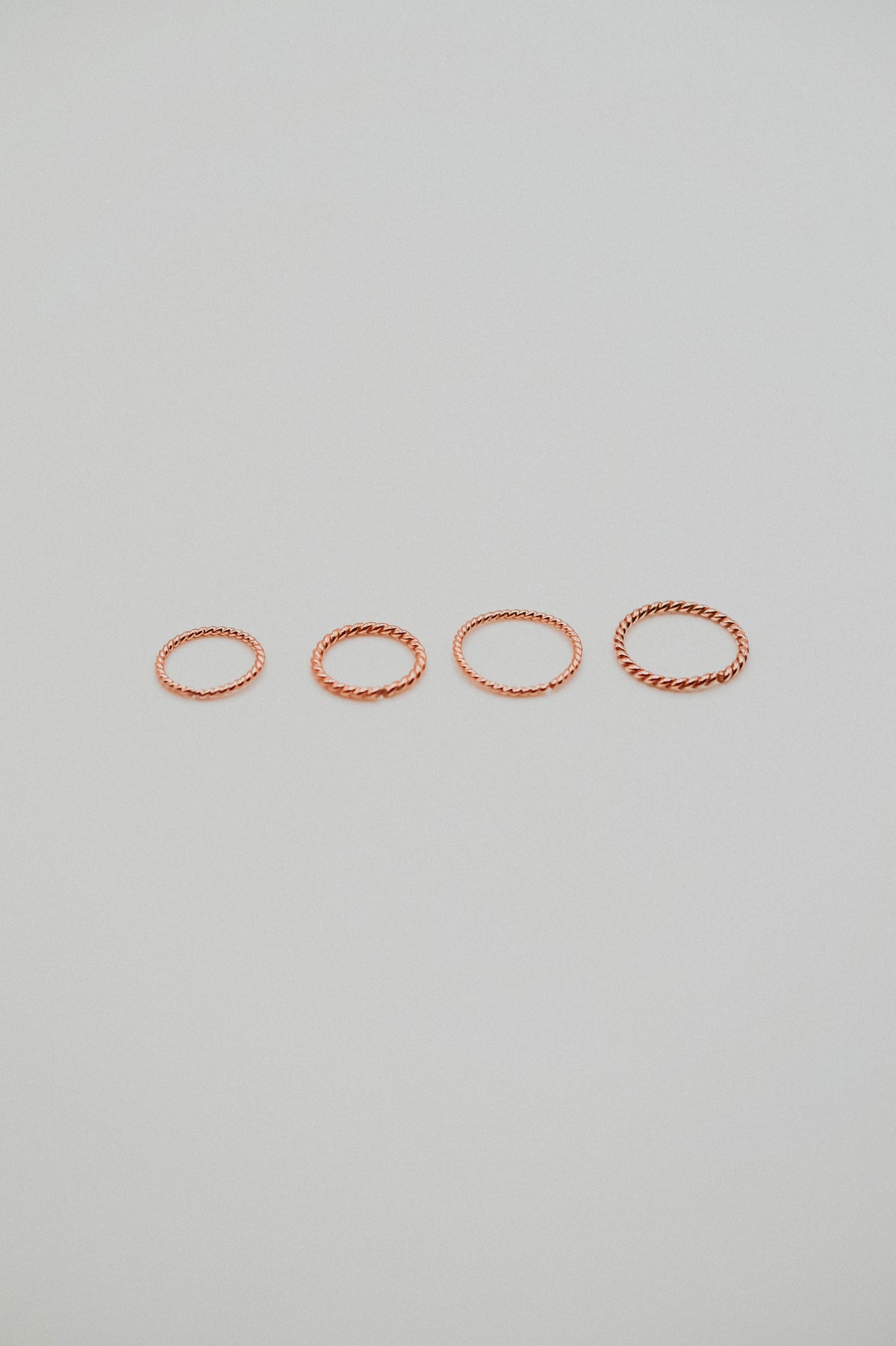 Twist Huggie Hoop Earring in Solid 14K Rose Gold