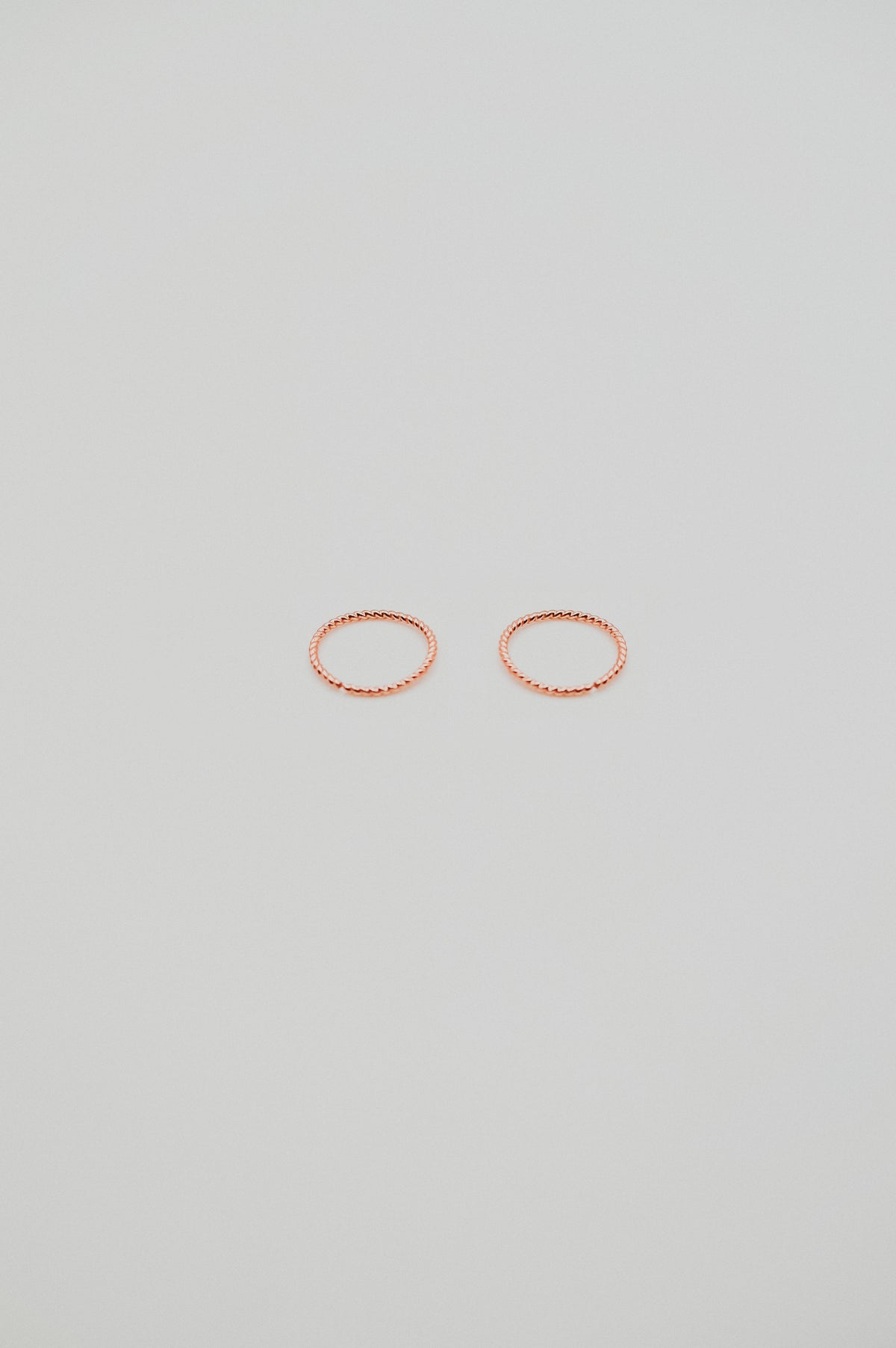 Twist Huggie Hoop Earring in Solid 14K Rose Gold