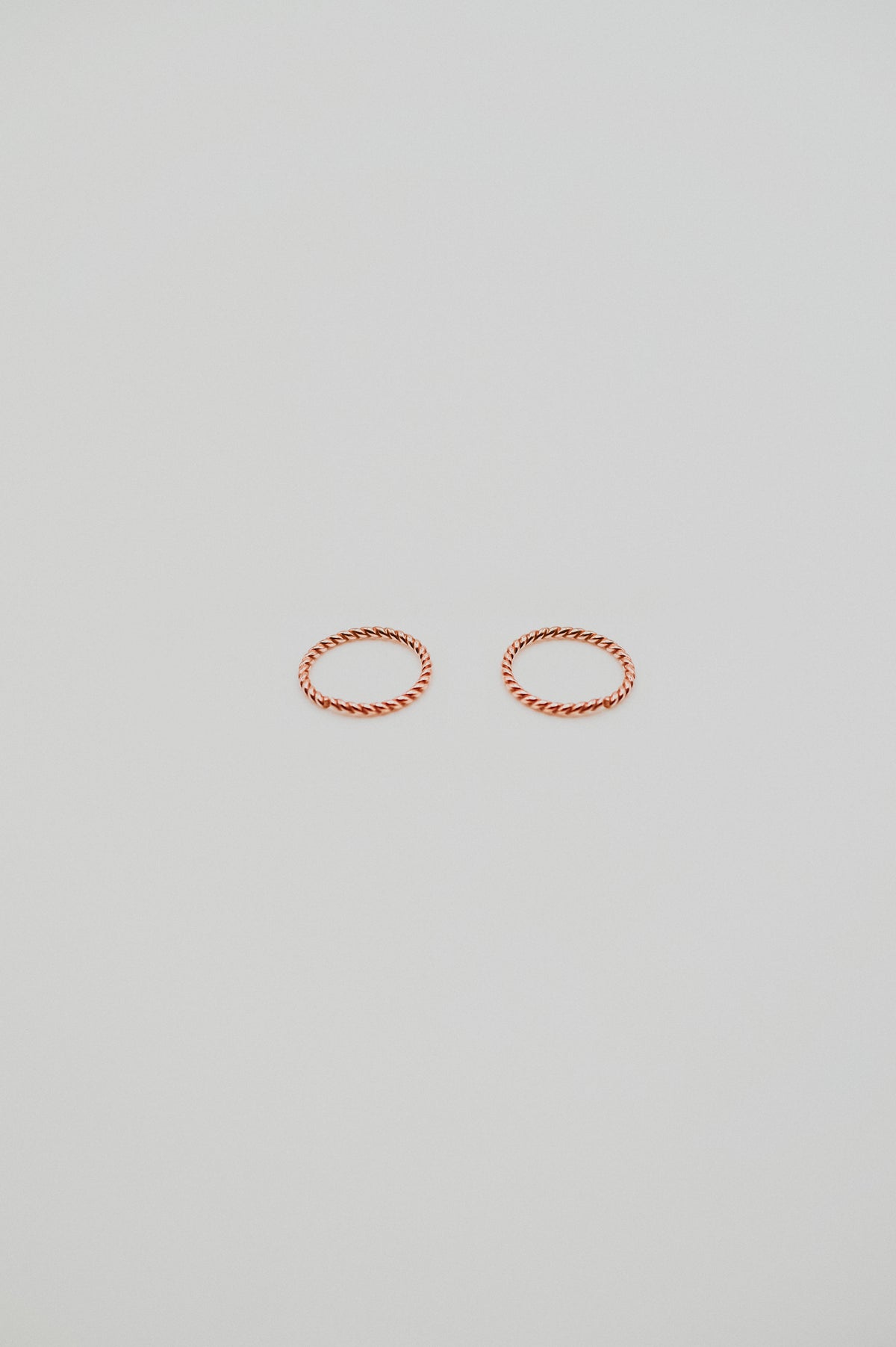 Twist Huggie Hoop Earring in Solid 14K Rose Gold